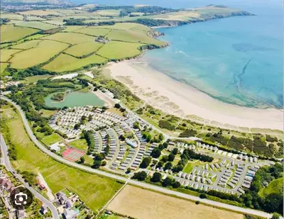 an aerial view of a park next to a beach at The Driftwood Den in Tywardreath