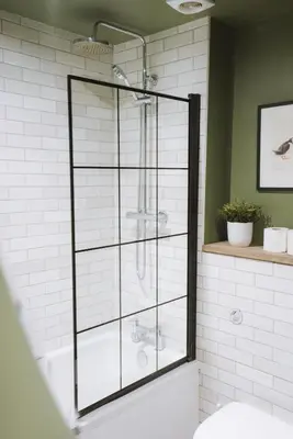 a shower with a glass enclosure in a bathroom at Stunning High Street Townhouse With Sea Views & Parking at 'Tide View Townhouse' in Falmouth