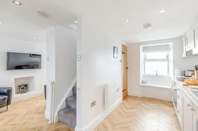 a kitchen with white walls and a stairway at 2 Bed in Porthleven oc-m28188 in Porthleven