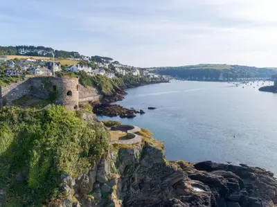 an old castle on a cliff next to the water at 2 Bed in Ruan High Lanes oc-r29865 in Ruan Lanihorne