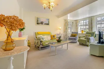 a living room with a couch and a table at 1 Bed in Trewoon oc-t29505 in St Austell