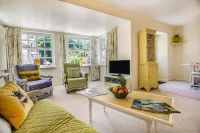 a living room with a couch and a table at 1 Bed in Trewoon oc-t29505 in St Austell