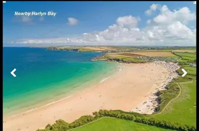 an aerial view of a beach and the ocean at Sandydaze in St Merryn