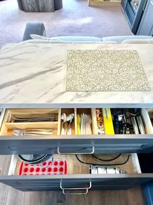 a drawer in a bed with tools in it at The Lobster Pot in Tywardreath