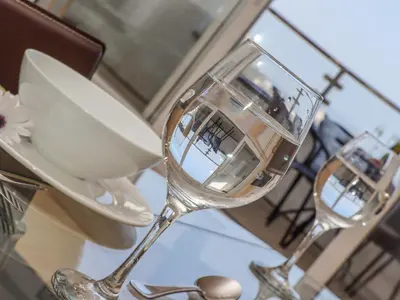 two wine glasses sitting on top of a table at Mariners Watch in St Ives