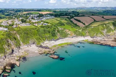 an aerial view of the shoreline of a beach at Luxury Seaview, Modern, 6 beds in Mevagissey