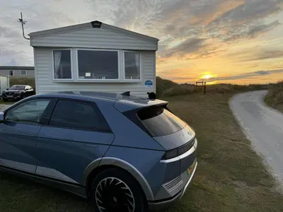 a car parked in front of a tiny house at Perranporth Coastal Retreat- Sleeps8 in Perranporth
