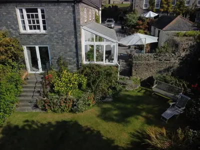 an aerial view of a house with a garden at Glebe Barn in Ruan Lanihorne