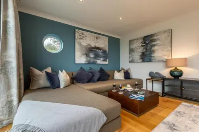 a living room with a bed and a couch at 4 Bed in Carbis Bay oc-m30075 in Carbis Bay