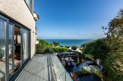 an ocean view from the balcony of a house at 4 Bed in Carbis Bay oc-m30075 in Carbis Bay
