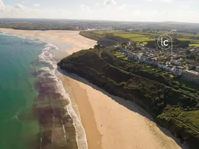 an aerial view of the beach and the ocean at Offshore, Carbis Bay, St Ives in Carbis Bay