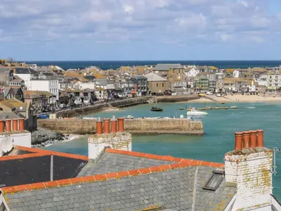 a view of a town with a body of water at Mor Kernow in St Ives