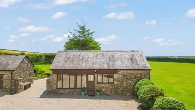 an image of a stone house at The Dairy in Liskeard