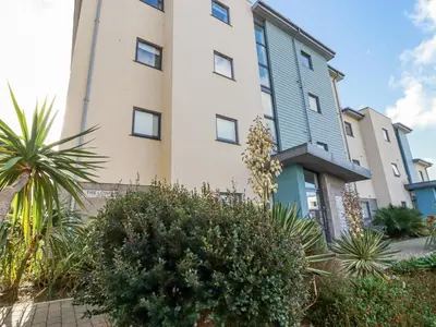 a building with plants in front of it at 33 Tre Lowen in Newquay