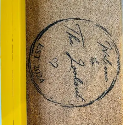 a drawing of a face on the floor at The Lookout in Carbis Bay