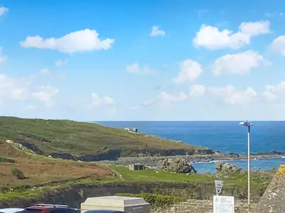 a view of the ocean from a road at Ocean Breezes in St Ives