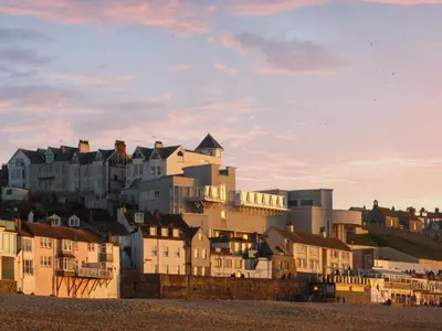 a group of houses on top of a hill at Ocean Breezes in St Ives