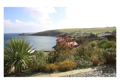 a view of a body of water with plants at Ocean View, 5 bedrooms sleeps 10, stunning views, parking x4 in Mevagissey
