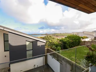 a view from the balcony of a house at Fistral Tide in Newquay