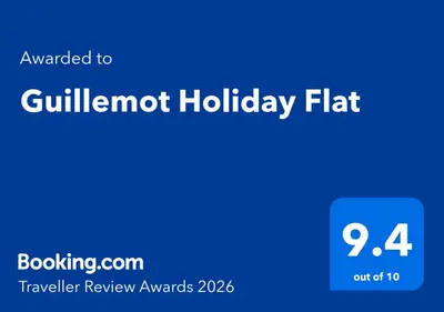 a blue sign with the words vulnerability holiday flat at Guillemot Holiday Flat in Looe