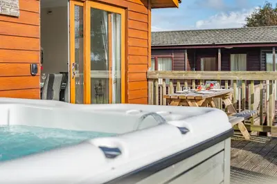 a bath tub on the deck of a house at 3 Bed in St. Merryn oc-r30137 in St Merryn