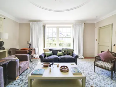 a living room with a couch and a table at Tower Hill in Bodmin