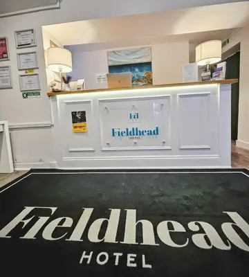 a hotel sign on the floor of a hotel lobby at Fieldhead Hotel, Looe in Looe