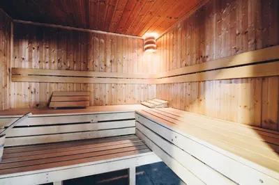 a wooden sauna with a bench in it at Rubys Retreat - 6 Berth Caravan in Newquay, Cornwall in Newquay