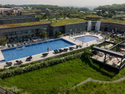 an aerial view of a resort with a swimming pool at Una, Lodge 73 in St Ives