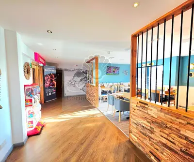 a room with a table and a dining room at JL Cornwall Newquay Caravan in Newquay