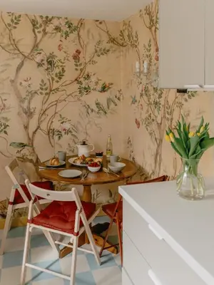 a kitchen with a table with food on it at Rose Garden Maisonette in Falmouth