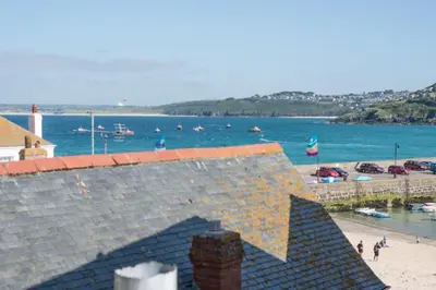 a view of a beach with boats in the water at Ponckle's Place in St Ives