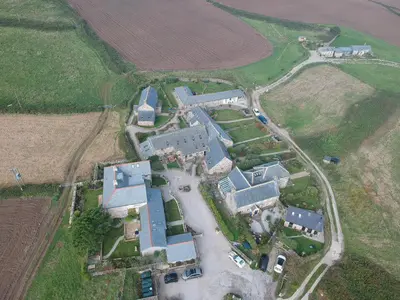an aerial view of a house with a yard at Quick's Cottage in St Ives
