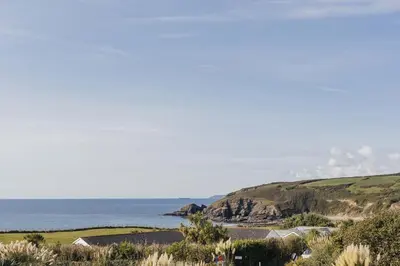 a view of the ocean from a hill at Seasky in Praa Sands