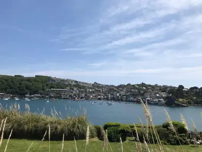 a view of a body of water with boats in it at Apartment Sea Views & Terrace on Waters Edge in Polruan in Polruan