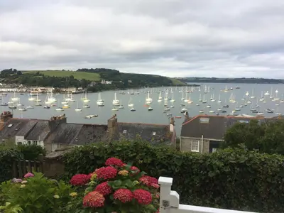 a view of a harbor with boats in the water at April Cottage in Falmouth