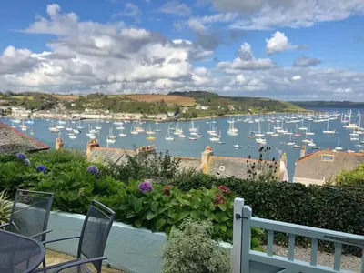 a view of a harbor with boats in the water at April Cottage in Falmouth