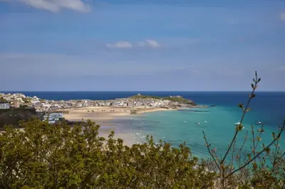 a view of a beach with houses and the ocean at Stunning Apartment Balcony Sea Views St Ives in St Ives