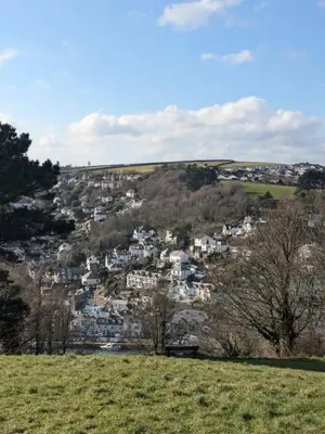 a view of a town on a hill with houses at Peaceful Home in Looe with Stunning Views in Looe