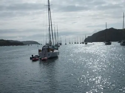 a group of boats in a body of water at Romantic cottage with fantastic coastal views in Marazion
