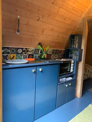 a kitchen with a blue counter top in a room at Silverspring Hideaways in Constantine