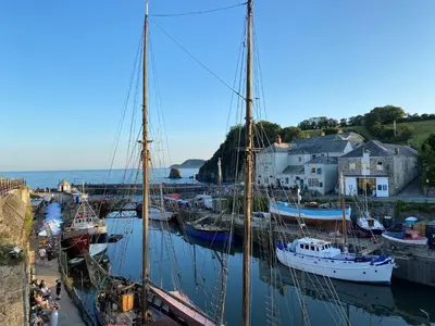 a group of boats docked in a harbor at Carole's Cottage - Private Parking, Sea Views, Garden & Close To Harbour & Beach in Charlestown