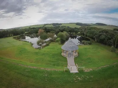 an aerial view of a gazebo in a field at The Old Coach House at Hendra Barns in Newquay