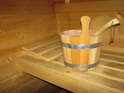 a wooden bucket in a sauna at Lux Hot Tub Lodge, Retallack nr Padstow and Newquay in Padstow