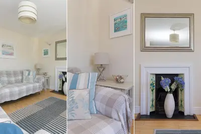 two pictures of a living room with a couch and a fireplace at Captain's Rest in St Ives
