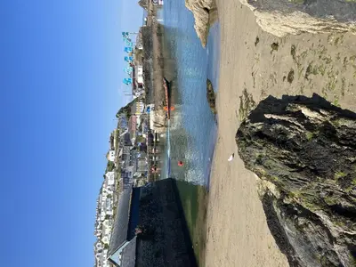 an aerial view of a construction site on the ocean at Holiday Home Piskey Cottage by Interhome in Mevagissey