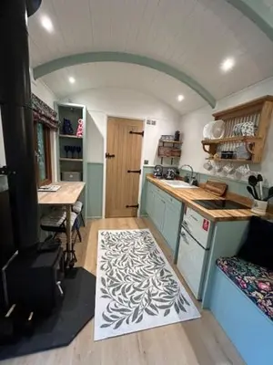 a kitchen with a sink and a counter top at Waters Meet in Warleggan