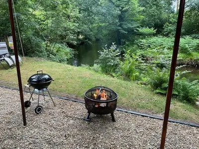 a grill and a bbq with a grill and a grill at Waters Meet in Warleggan