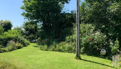 a telephone pole in the middle of a yard at Kernyk in Redruth