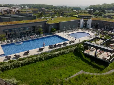 an aerial view of a resort with a swimming pool at Villa 80 in St Ives